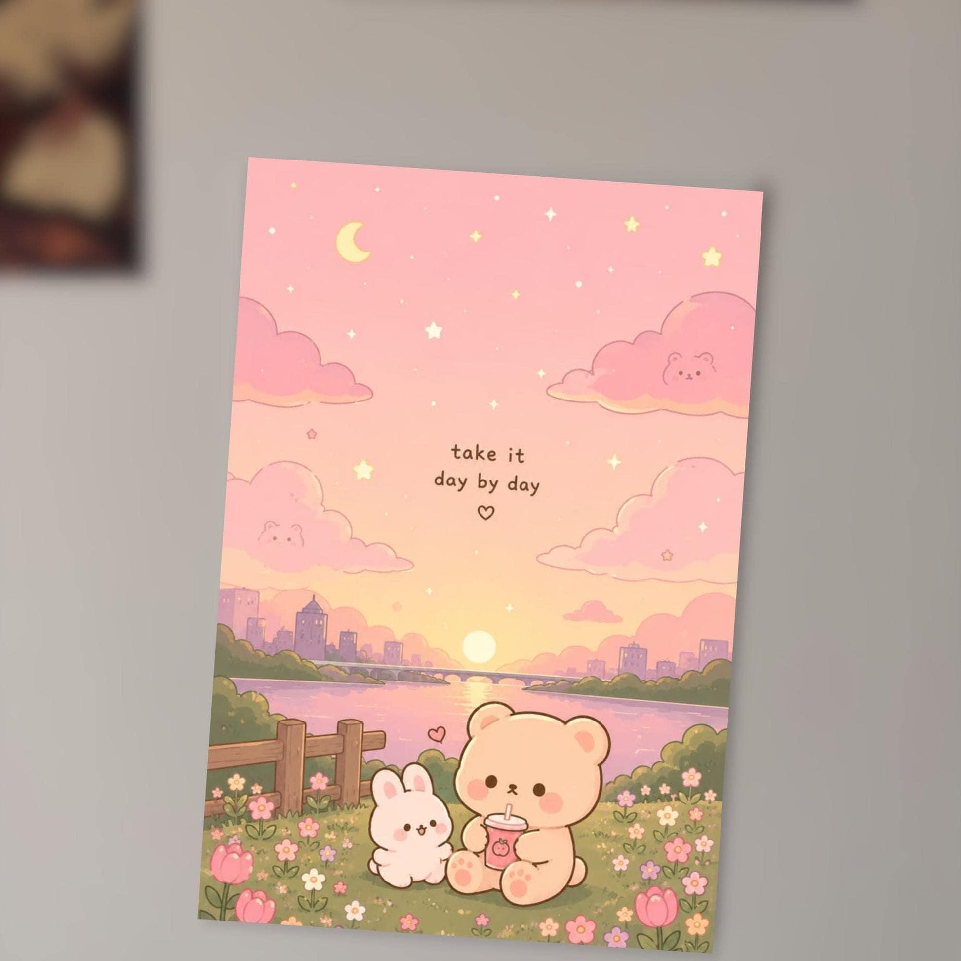 A colorful illustration depicting a serene scene with a pink sky, clouds, and a sunset, along with a small bunny and a bear sitting together in a field with flowers.