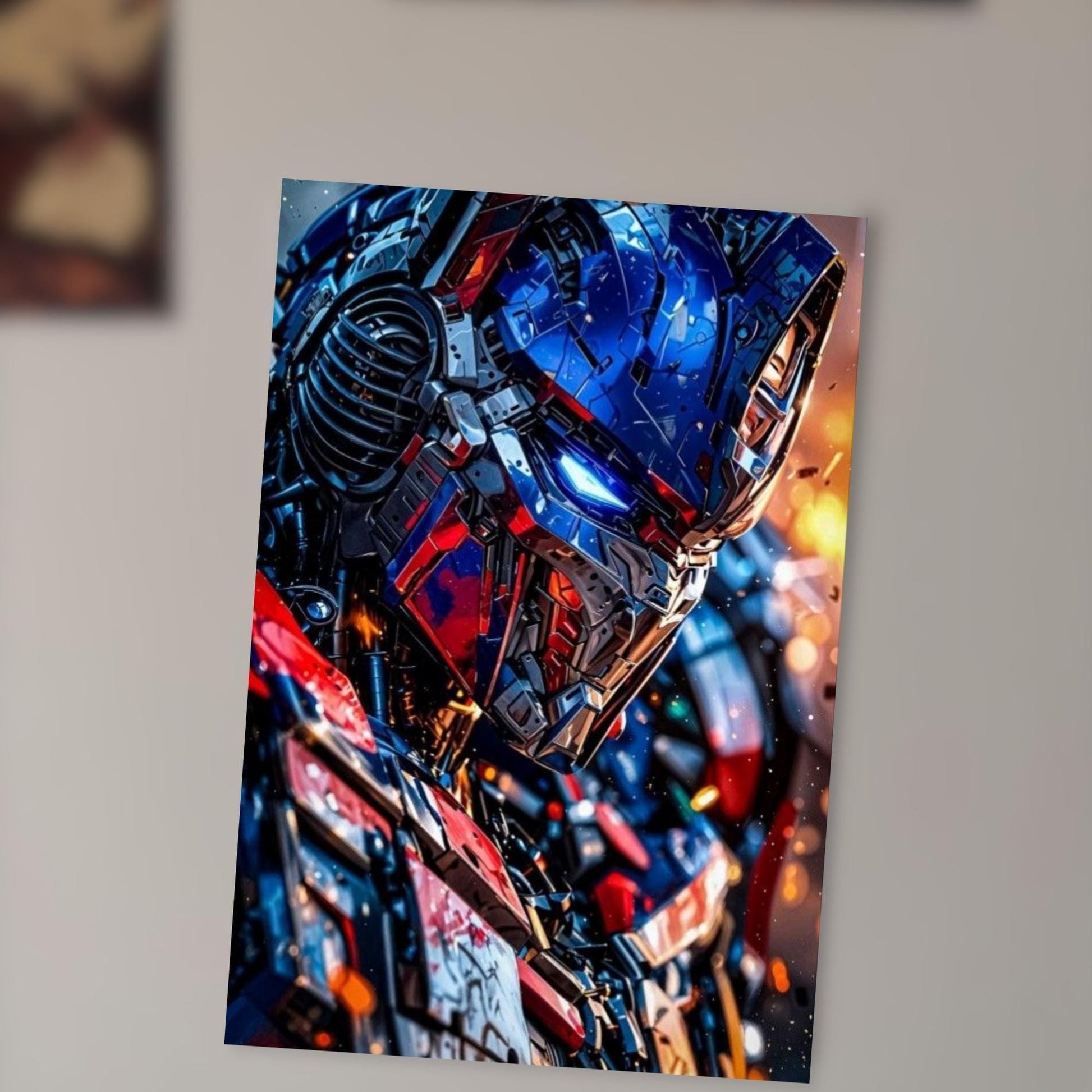The image is a close-up of a robot or mechanical figure, with a striking combination of blue, red, and black colors. The robot appears to be in motion, with a dynamic and intense expression.